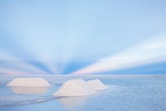 Anticrepuscular rays above salt piles